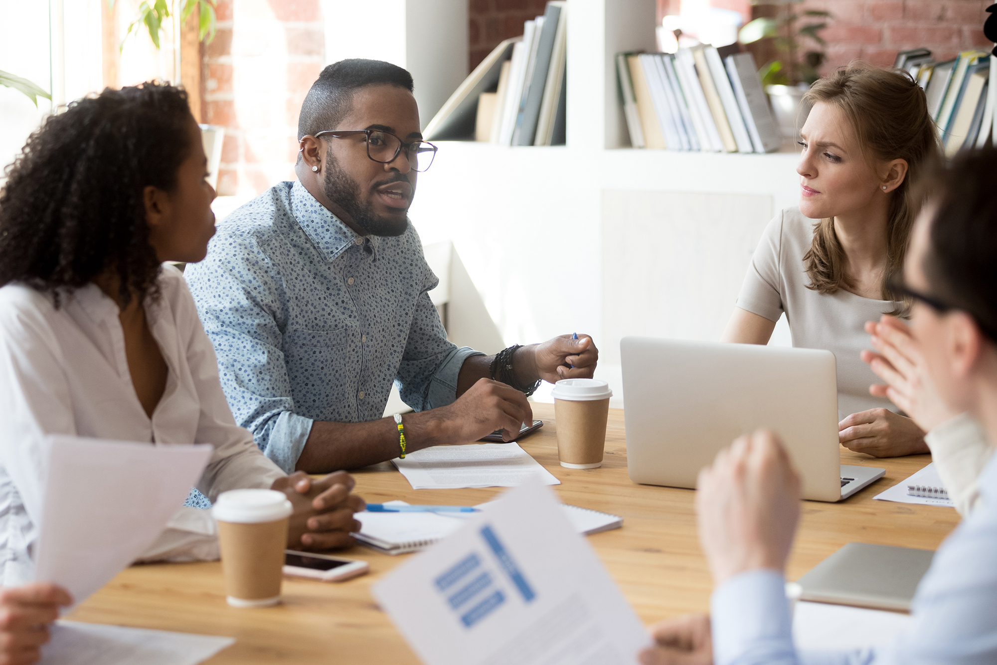 Diverse group meeting around the table