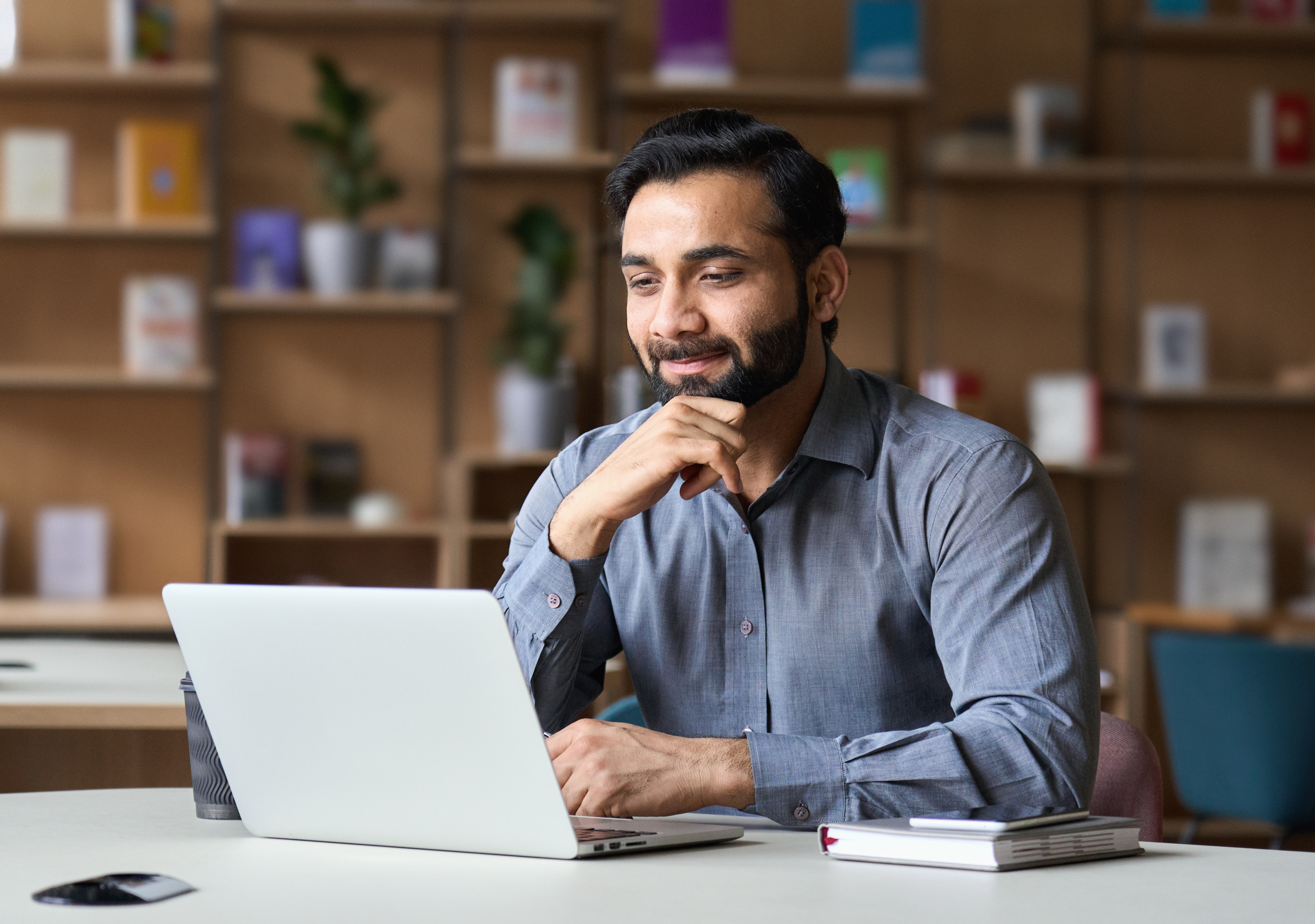 Asian man at laptop